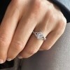 1 Ct Pear Moissanite & .26 Ctw Lab Diamond Halo Twist Vine Engagement Ring